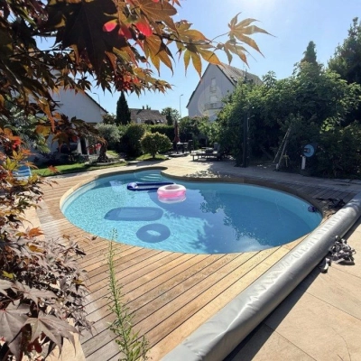 Plage de piscine en Thermofrêne et grès cérame à Haguenau
